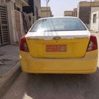 اوبترا ٢٠٠٨ • مصبوغ اصفر • حادث خلفي