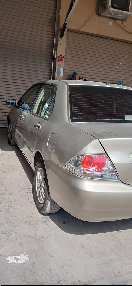 لانسر ٢٠١٠ • بدون ضربه • رقم اربيل