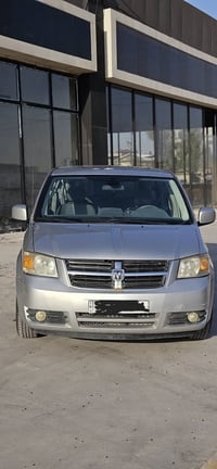 دوج كرفان موديل 2009  ماشيه ١٥٨ الف  لا مشتغله خط ولا اشتراكات  سياره ...