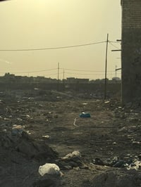 قطعه ارض ١٠٠ متر من جهه البانزين خانه منطقه علاوي الأسمر واقع حال خدما...
