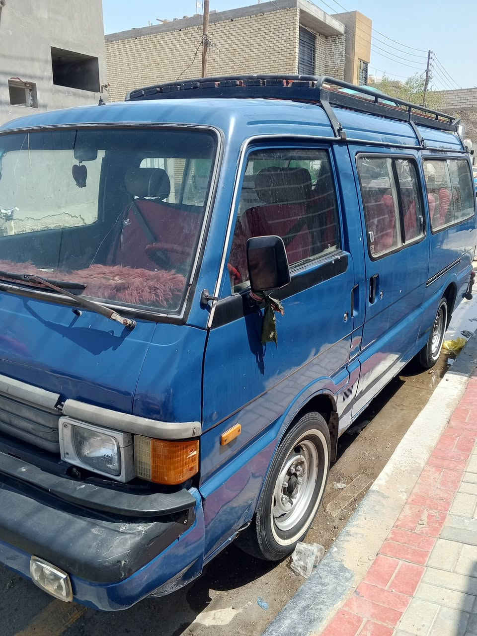 مازدا للبيع موديل1994 سنوية لغاية2029 خط حي العامل كربلاء السعر 70 للاستفسار الاتصال***********
