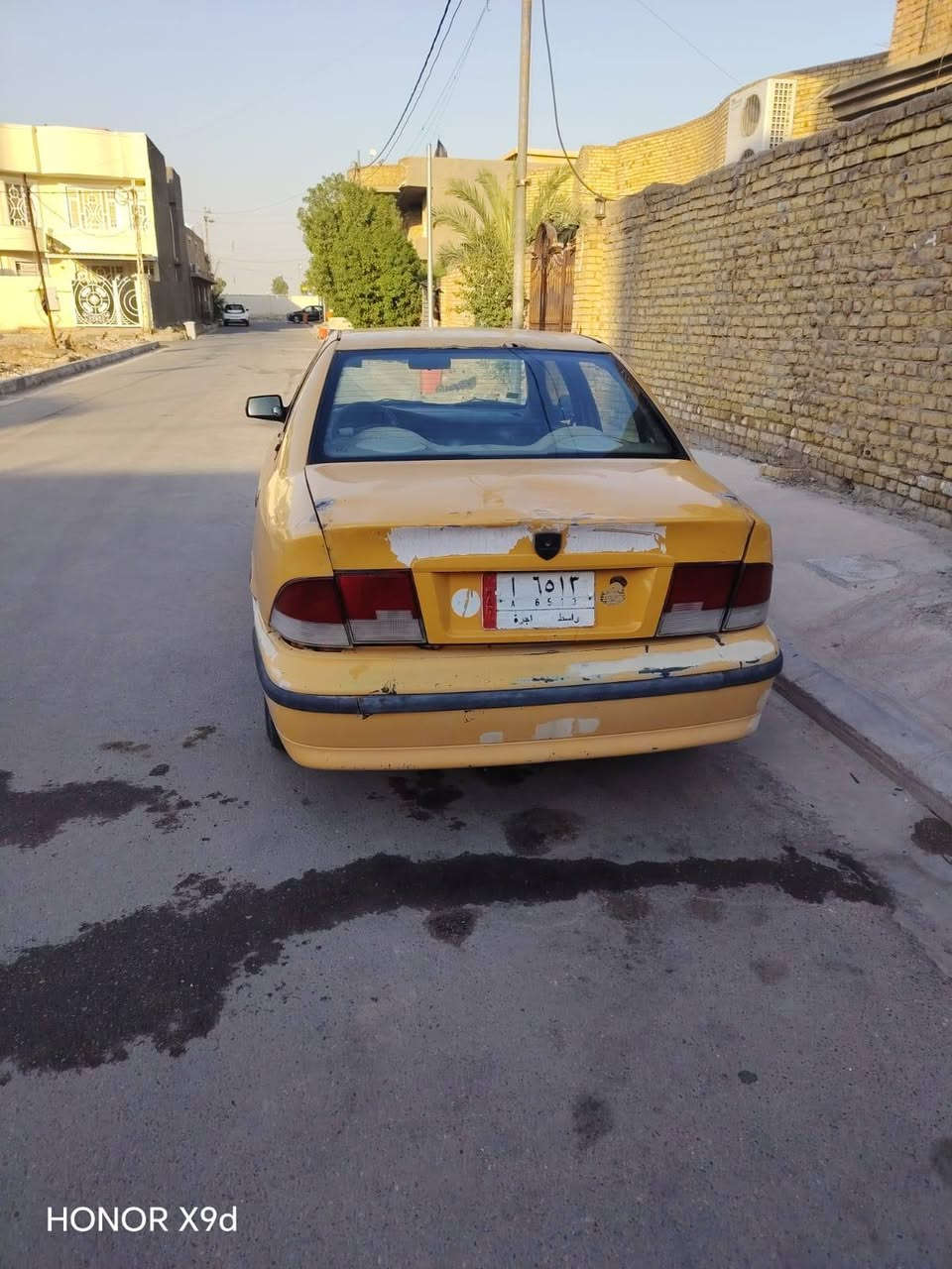 سياره سمند للبيع سعر14ورقه مداور مكاني كوت سياره خير من الله مكينه كير حداديه خياس معمر 
رقم راعيه ني مكلف. ***********

نص مكتوب في الصور:
- HONOR X9d