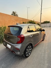 كيا بيكانتو 2022 جي تي لاين اعلى فئة  رقم بغداد باسمي مواصفات : رادارا...