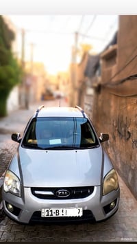 كيا سبورتج ستيشن لون رصاصي فضي 2009 خليجي صبغ حزام بدون قماره و بنيد و...