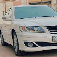 للبيع ازيرا موديل ٢٠١١  محرك ٢٧٠٠ خليجي  لون ابيض رقم بغداد أربع  ارقا...