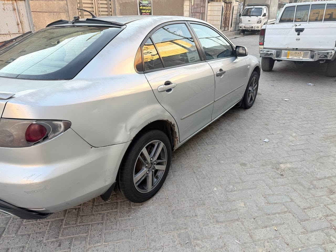 مازدا ياباني وارد خليجي اوتماتيك 
زوم 6 موديل 2003 محرك 2000 
رقم بغداد 
سيارة بلادية بدون صبغ 
محرك كير خير من الله
مشط ستيرن جديد 
كهربائيات كلهة شغالة
تبريد شغال 
مكانهة بغداد 
سعر 44 
هاتف ***********
