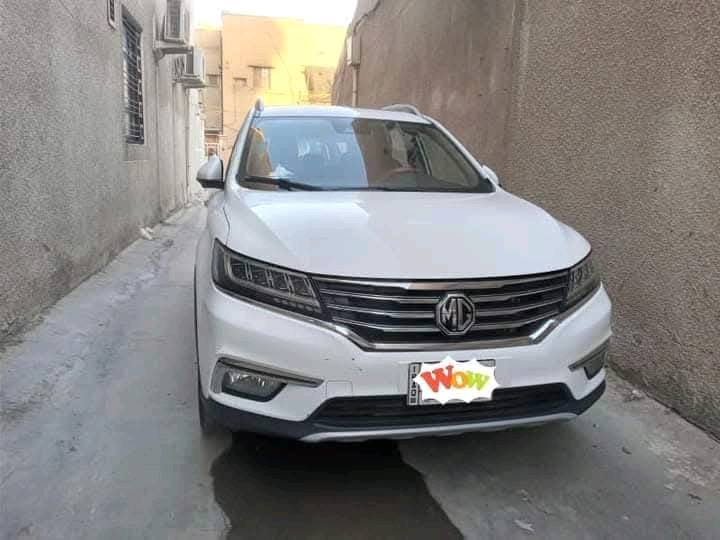 سيارة نوع MG/RX5
موديل/2021
اللون/أبيض
السيارة ماشية 69700 كم
تاريخ شرائها مباشر(صفر) من شركة MG في 2022/4/22
 لايوجد فيها اي دعمة
 يوجد فيها ضمان صيانة المتبقي منه 2 سنة من اصل 6 سنوات
  السيارة جناي وليس بياع شراي.. موظف.. فقط من البيت الى الدائرة والعكس ونضيف شرط الفحص وتتاكد اي ضربه وصبغ قوي او حادث مبيها دواخلها بلادي برغي ممبدل منها نضيفه تجي شرط الفحص وين يعجبك واي مكان يعجبك وتبريدها ثلج رقمها بغداد ما عليها اي غرامات وتحويل مباشر ما بيها اي مشكله
سعرها114 او عراقي 18 مليون 
***********
هلا، شنو الفئة/الترِم بالضبط للـ MG RX5: ستاندرد لو فل كامل، وشنو نوع المكينة والقير؟: 
مكينه وكير ضمان. محرك2000 تيربو
وين موقع السيارة هسه؟ يعني بأي محافظة/منطقة ممكن المعاينة والفحص؟: 
بغداد الاعظميه
هل بيها أي مواصفات إضافية مهمّة مثل بانوراما، شاشة، كامرة خلفية، حساسات، بصمة، أو شحن لاسلكي؟: 
كامله مواصفات
شنو وضع الإطارات والبطارية والصيانة الدورية؟ وهل أكو تبديل قطع أو صيانة جديدة سويتها مؤخرًا؟: 
بلادي كلشي ما مغير بيها
البيع مباشر لو أكو وكالة/تفويض؟ والسعر نهائي لو قابل للمساومة؟: 
مباشر البيع والسعر نهائي