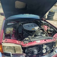 مرسيدس 560SEL • كشنات جلد • فتحة سقف