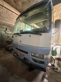 كوستر نيسان موديل ٢٠٠٣ شرت تحويل  رقم 07511380982 بي واساب
