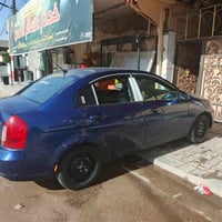 اكسنت • ٢٠٠٩ • رقم بغداد