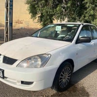 لانسر • ٢٠٠٦ • اوتوماتيك