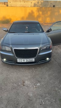 السياره عليها تخم تايات ابولو انتاج 2025 كرايسلر c300 لمتيد 2012 سياره...