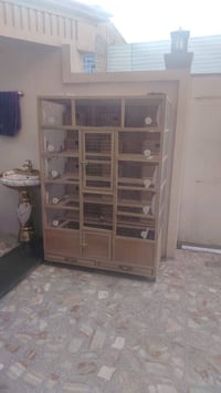 قفص جديد تكنه درجه اوله مع بيوت طيور حب هم درجه اوله  استعمال شهر ونصف...