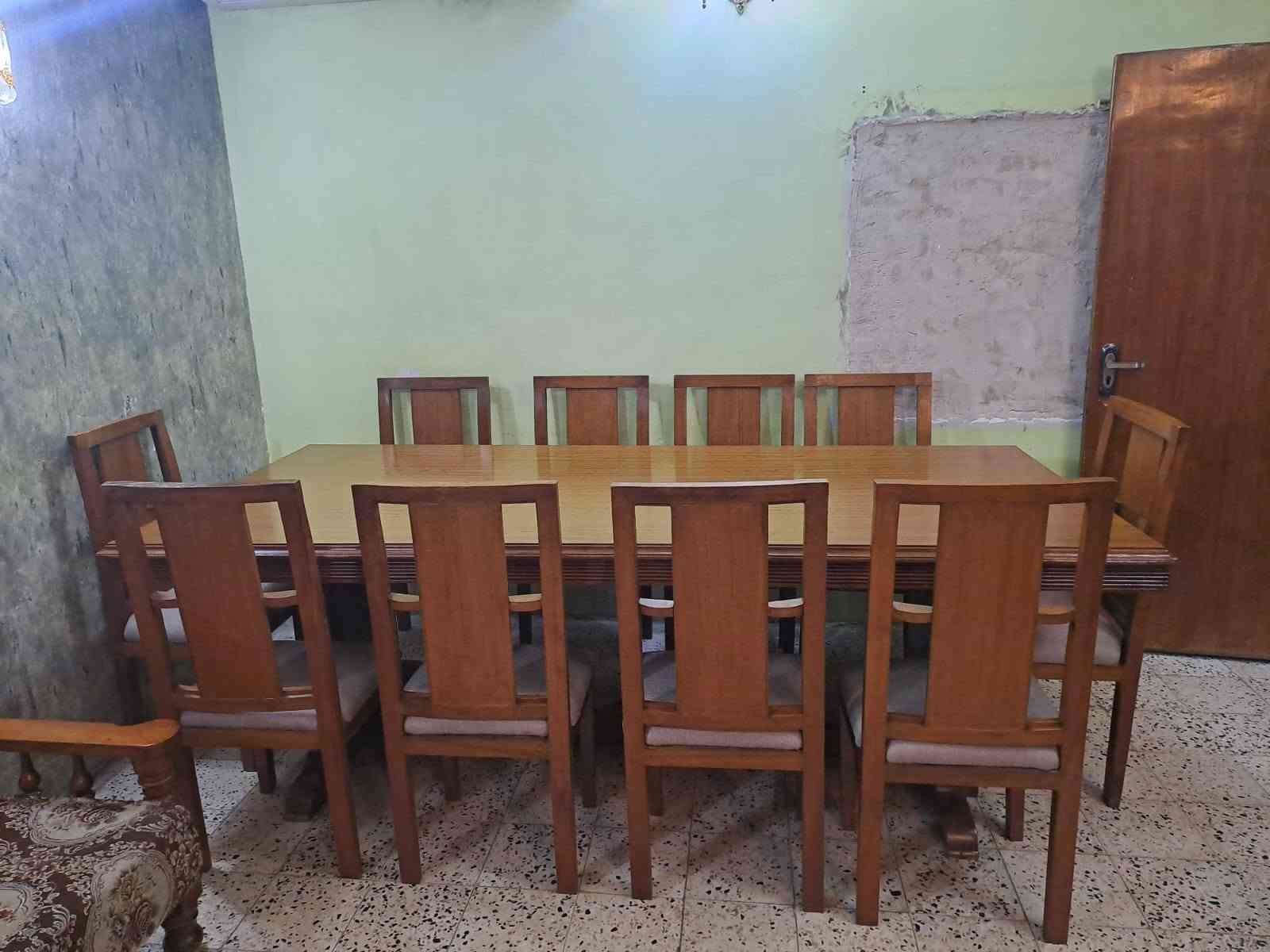 ميز طعام ١٠ كراسي ملكي خشب صاج بورمي شغل عراقي بدون اي ضرر الاتصال ***********
