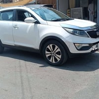 كيا سبورتج موديل 2011 خليجي فول مواصفات 1/1 لون ابيض  باسمي شرط التحوي...