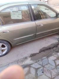 عندي نيسان مكسيما للبيع موديل 2003 السعر 45 وبيها مجال للاستفسار 07808...