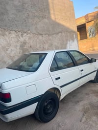 بيجو 405 • ٢٠٠٩ • محرك مكفول