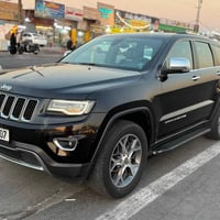 جيب كراند شيروكي لمتد موديل 14 وراد أمريكي الي جانيها يعرف شنو  بيها ص...