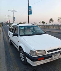 مازدا 323 • ١٩٩١ • مكينه كير شرط
