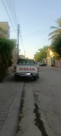 سياره نيسان 2005 للبيع  العنوان النجف  رقم 07810527788