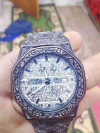 ساعه شغاله طراز من جدار الكعبه بلاااااش قيمه واخذه