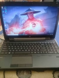 لابتوب hp workstation بي كارت شاشة خارجي نيفيديا ٢كيكا  نص مكتوب في ال...