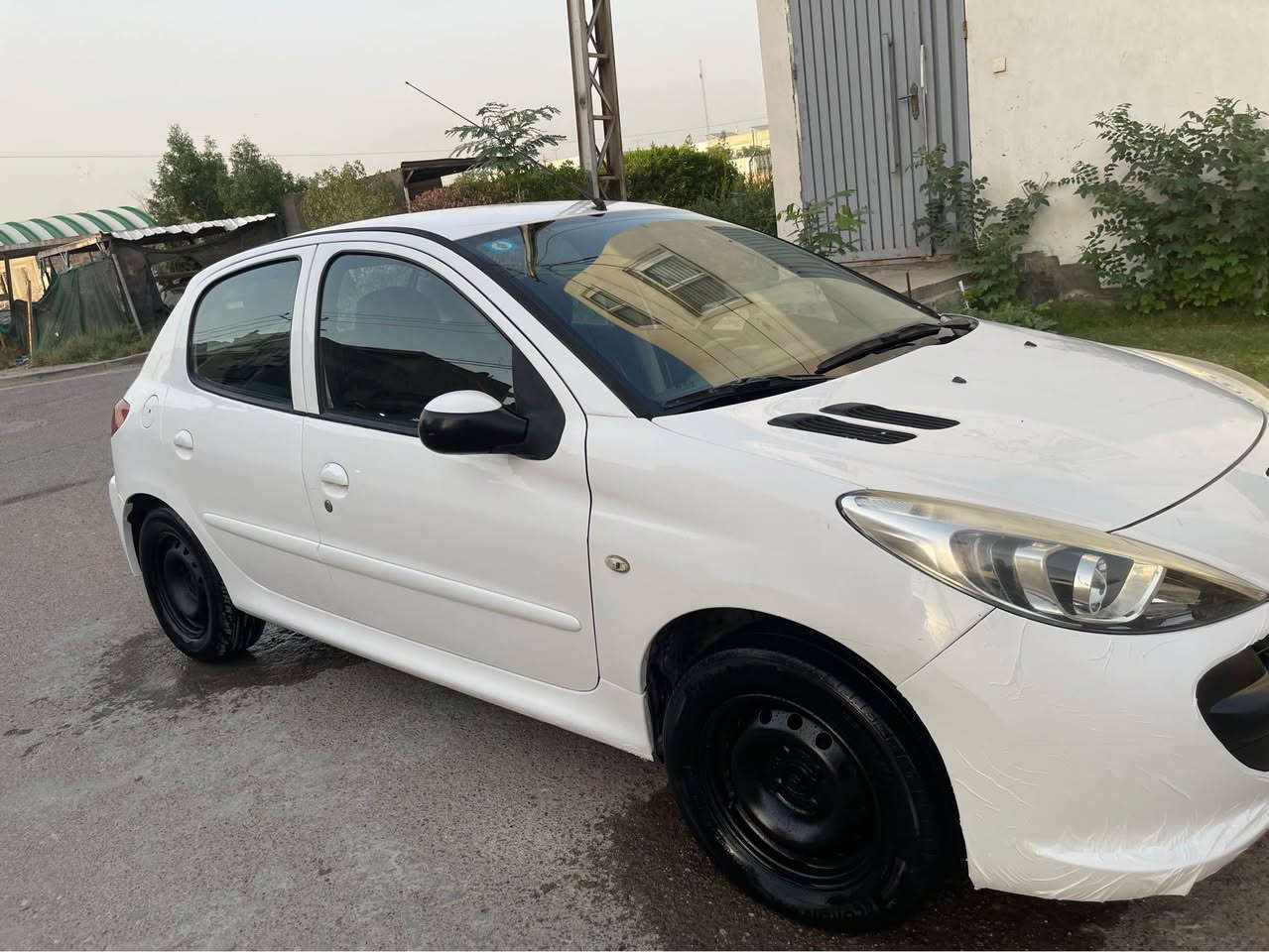 بيجو 206 • ٢٠١٢ • شرط التحويل