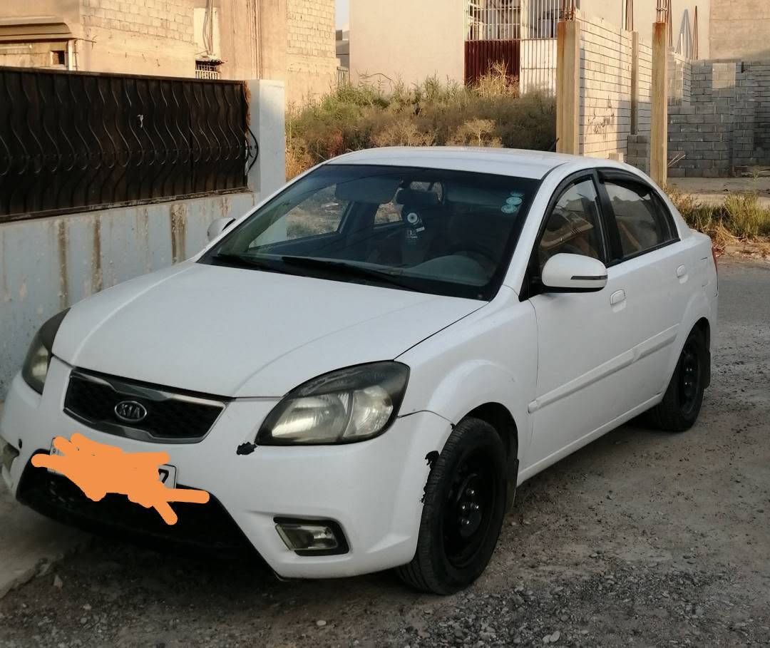 ريو لون ابيض موديل ٢٠١١ للبيع محرك ١٦ أرضية جلد تبريد وتدفئة شاشه اي باد شغال محرك وكير شرط بيها صبغ بوند وتعديل بارد نص جاملغ امامي *********** +واتساب موصل, نينوى
