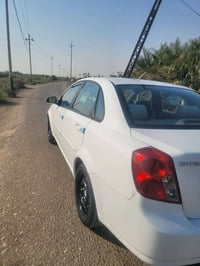 وبتره موديل ٢٠١٢ رقم بغداد مشروع وطني بيه صبغ بل جنطه وبل جملغ الخلفي ...