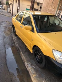 لانسر ٢٠٠٩ • كير اوتوماتيك • خليجي