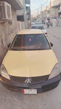 لانسر • ٢٠١٠ • مكينه ٢٠٠