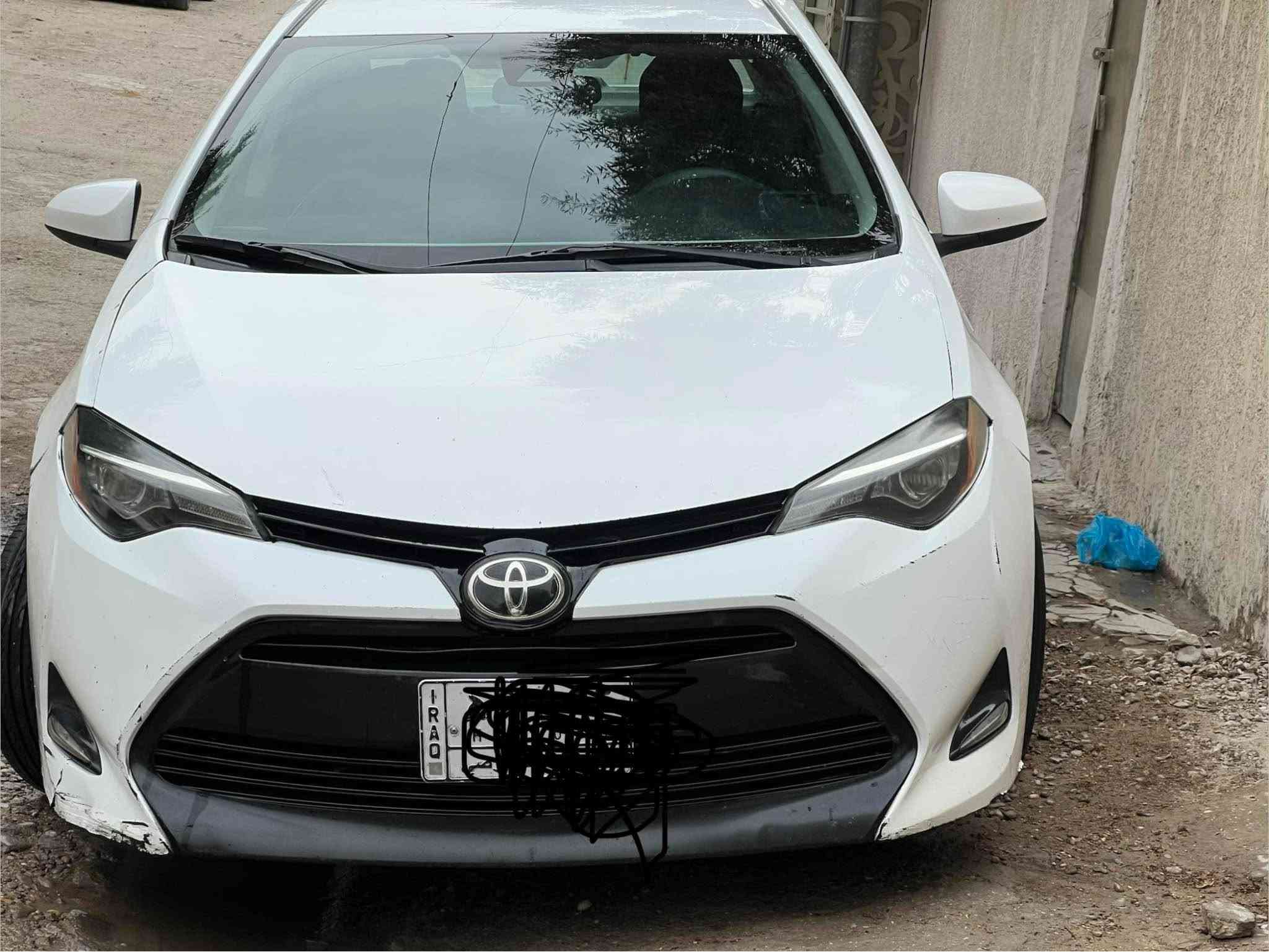 مكاني بغداد الامين 
***********
*********** بغداد, العراق

نص مكتوب في الصور:
- Toyota Corolla L 2017 White 1.8L 4 vin: 5YFBURHE5HP673031