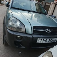 توسان ٢٠٠٩ للبيع ٣ قطع صبغ ابيع مصبوغ حزام فقط مكانها الدوره ابو دشير ...