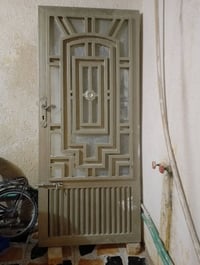 باب • تسكام • قفل