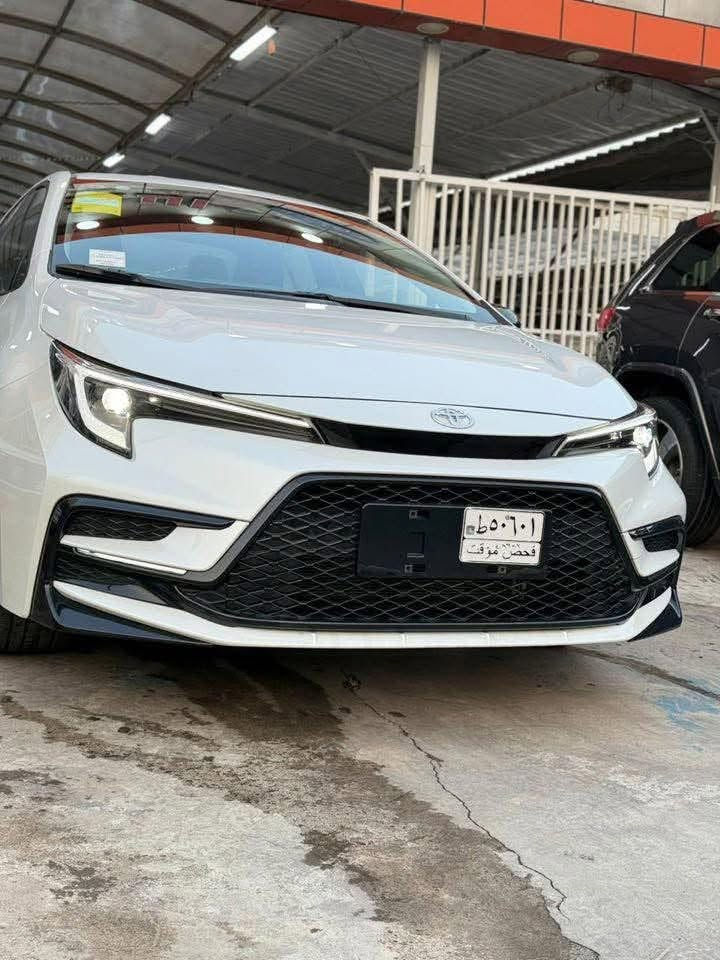 🚨🚗 الفرصة قدامك… لا تفوتها مع الاخوين  للسيارات! 
رجع توفر الكورلا البلاك ادشن موديل 2025
✨ امتلك الآن تويوتا كورولا سبورت ✨
محرك 1800 هايبرد – فئة البلاك إدشن البلادي الأصلي
( قطع اخيرة )
السعر : 27,500 مرقم كامل تستلم سنوية ولوحات 🔥🔥

السعر: 27,100 بدون رقم 

⚡ مواصفات خيالية بانتظارك: ⚡

☀️ فتحة سقف سلايد
🔑 بصمة + دخول ذكي
♨️ مقاعد جلد أصلي + مقعد كهربائي
🧠 رادار + تحديد مسار + قيادة ذاتية
✨ هاند بريك كهربائي + لايت زينون
⚫ جنح أسود + مرايا سودة + كتابات سوداء
🖤 ويل كب أسود + علامة خلفية سودة
📸 شاشة متطورة + كاميرا دوارة + عداد ديجيتال
⚙️ تحكم مقود جانبين + درايف مود + أوتو هولد
🛡️ فل سيستم إيرباك + مانع تصادم + مانع انزلاق

📍 موقعنا: بغداد – الوزيرية – مقابل المجمع العلمي 

البيع فقط نقد 
شامل الدلالية 
📞 للحجز أو الاستفسار السريع:

☎ ***********
☎ ***********
☎️***********

🚗✨ لا تفوت الفرصة الذهبية!
✨ احجز سيارتك الآن قبل نفاد الكمية! ✨
تميّزك يبدأ من معرض الاخوين للسيارات – انت المميز باختيارك
