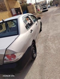 لانسر بومه • ٢٠٠٤ • ١٥٠٠
