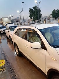 سورنتو ٢٠١٤ • ٧راكب • رقم بغداد