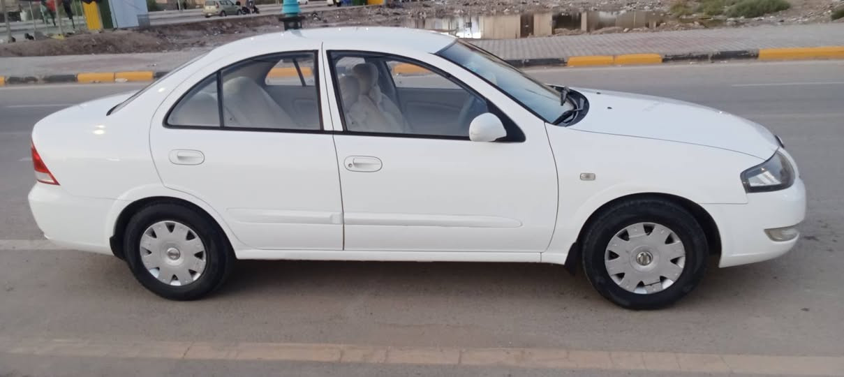 نيسان سني كوري موديل 2013 رقم بغداد انكليزي بسمي مكفولة بيها بارد بالجاملغ الامامي اليمين وطخة بالدوسة السيارة جاهزة السعر خاص اتصال على الهاتف *********** مكاني كوت
