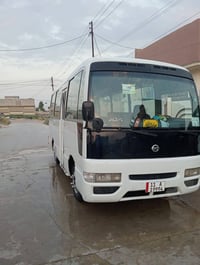كوستر نيسان • ٢٠٠١ • رقم بغداد