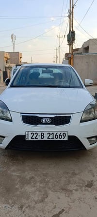 كيا ريو • ٢٠١١ • أبيض
