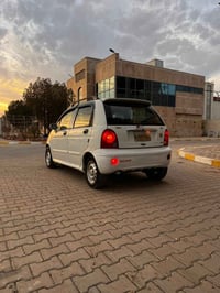 كيو كيو • ٢٠١٢ • مكفول گير ومكينة