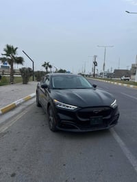 فورد ‏موستينج  2023  كهرباء كامل لون اسود  قاطعه مسافة 23 الف بطارية ل...