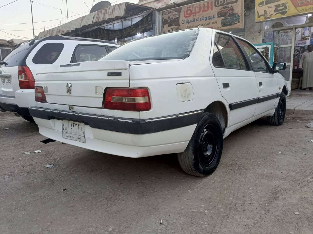 بيجو 405 مكينة جديدة وحدادية جديدة تبريد ثلج سعر27 بيه مجال شراي يتصل *********** الدوانيه قضاء غماس
