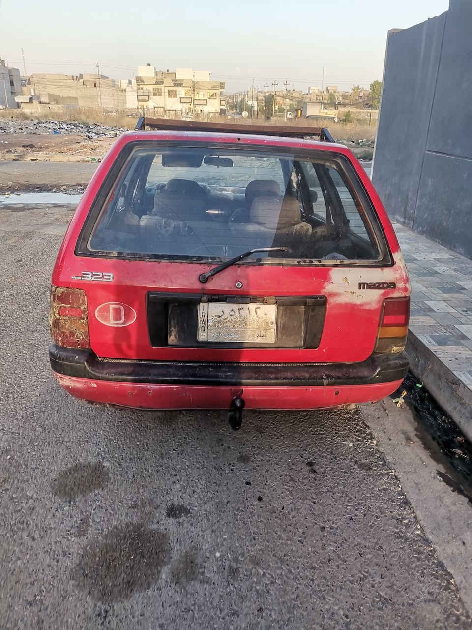 مازد ٣٢٣ للبيع مكينه كير شرط بيها كابون شرط التحويل سنويه بسمي اعوزها ترتيب سعر٢٠ وبيها مجال *********** او***********
