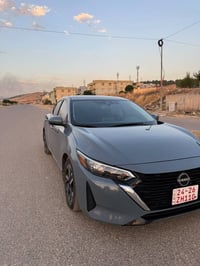 نيسان سنترا • SV ٢٠٢٥ • رمادي ناردو