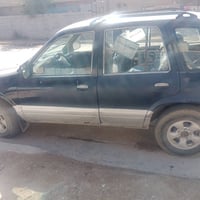 كيا سبورتج موديل ٩٧ محرك نظيف جداً أصلي  كير عادي نظيف رقم بغداد ألمان...