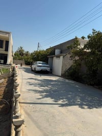 الخناسة • دونم بيت طابقين • واجهة ٣٥م