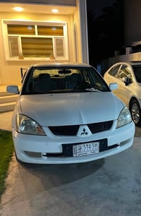 لانسر • ٢٠١١ • باسمي