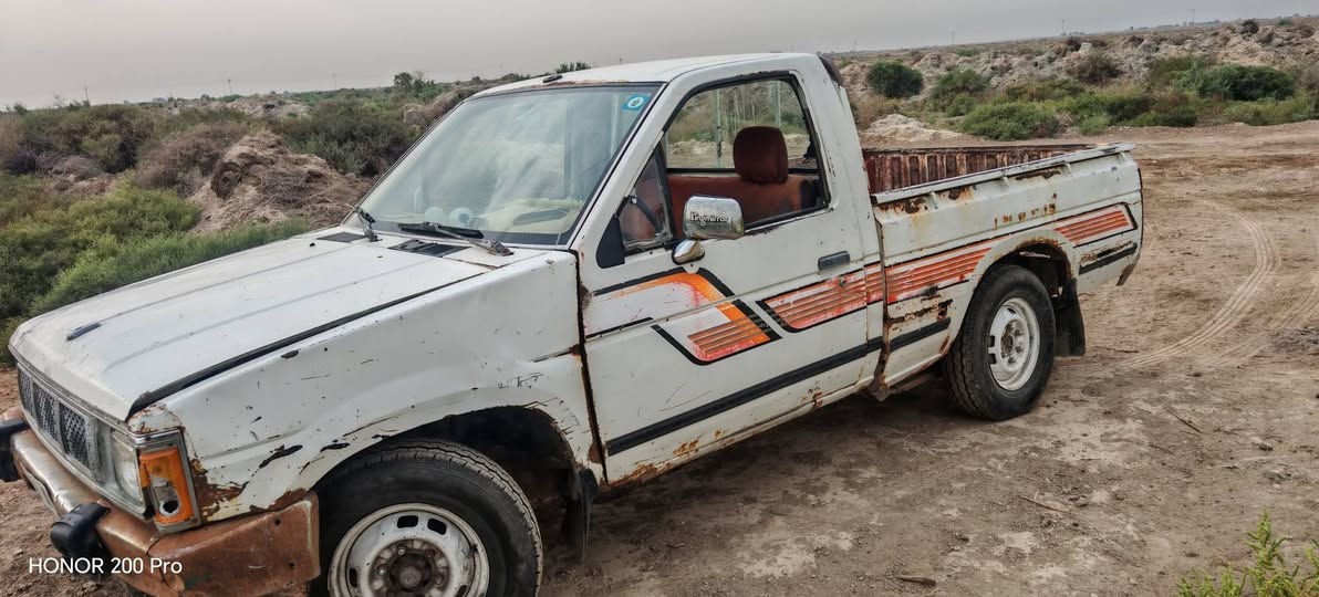 نيسان • محرك ٢ ونص • رقم انكليزي