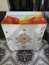 غسالة جديدة • قنينة غاز